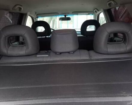 Серый Мицубиси Аутлендер, объемом двигателя 2.38 л и пробегом 143 тыс. км за 7300 $, фото 4 на Automoto.ua