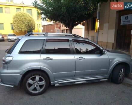Сірий Міцубісі Аутлендер, об'ємом двигуна 2 л та пробігом 420 тис. км за 6140 $, фото 2 на Automoto.ua