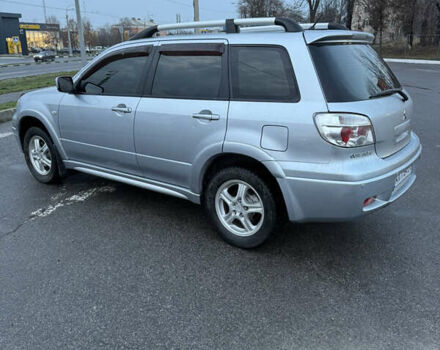 Сірий Міцубісі Аутлендер, об'ємом двигуна 2.4 л та пробігом 190 тис. км за 7500 $, фото 3 на Automoto.ua