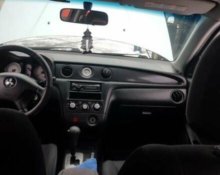 Серый Мицубиси Аутлендер, объемом двигателя 2.38 л и пробегом 700 тыс. км за 7058 $, фото 11 на Automoto.ua