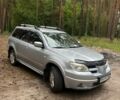 Серый Мицубиси Аутлендер, объемом двигателя 2.4 л и пробегом 225 тыс. км за 6350 $, фото 1 на Automoto.ua