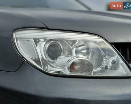 Серый Мицубиси Аутлендер, объемом двигателя 2.38 л и пробегом 254 тыс. км за 7300 $, фото 8 на Automoto.ua