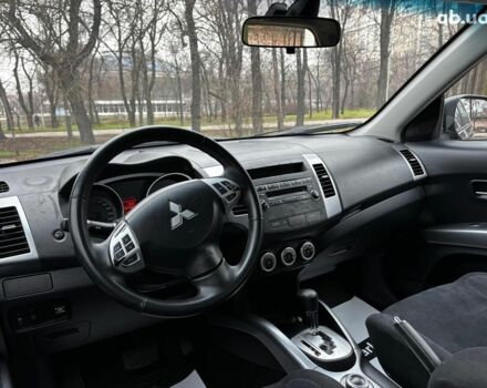 Серый Мицубиси Аутлендер, объемом двигателя 2.4 л и пробегом 237 тыс. км за 8490 $, фото 15 на Automoto.ua