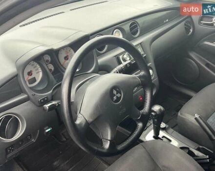 Серый Мицубиси Аутлендер, объемом двигателя 2.4 л и пробегом 324 тыс. км за 6890 $, фото 29 на Automoto.ua