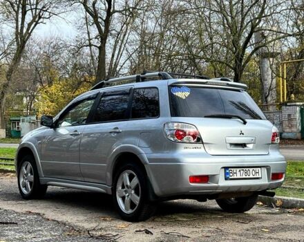 Серый Мицубиси Аутлендер, объемом двигателя 2.4 л и пробегом 170 тыс. км за 6900 $, фото 6 на Automoto.ua