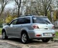Серый Мицубиси Аутлендер, объемом двигателя 2.4 л и пробегом 170 тыс. км за 6900 $, фото 6 на Automoto.ua