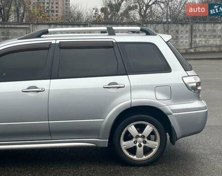 Серый Мицубиси Аутлендер, объемом двигателя 2.4 л и пробегом 324 тыс. км за 6890 $, фото 6 на Automoto.ua