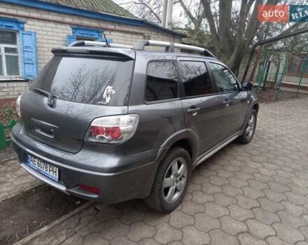 Серый Мицубиси Аутлендер, объемом двигателя 2.38 л и пробегом 143 тыс. км за 7300 $, фото 8 на Automoto.ua
