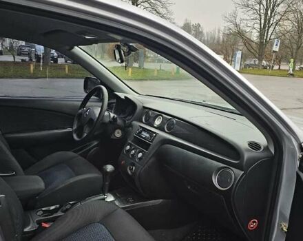 Сірий Міцубісі Аутлендер, об'ємом двигуна 2.38 л та пробігом 230 тис. км за 5700 $, фото 12 на Automoto.ua