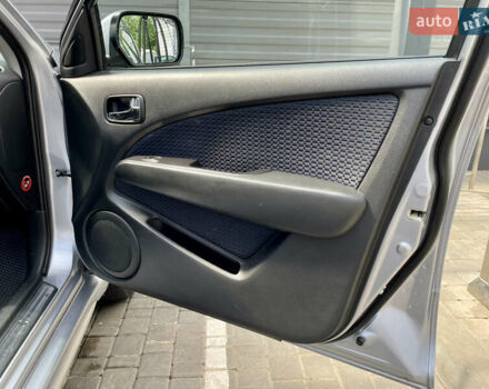 Сірий Міцубісі Аутлендер, об'ємом двигуна 2 л та пробігом 130 тис. км за 8500 $, фото 10 на Automoto.ua