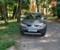 Серый Мицубиси Аутлендер, объемом двигателя 2.2 л и пробегом 208 тыс. км за 9300 $, фото 11 на Automoto.ua