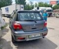 Серый Мицубиси Аутлендер, объемом двигателя 2 л и пробегом 235 тыс. км за 9000 $, фото 2 на Automoto.ua
