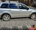 Серый Мицубиси Аутлендер, объемом двигателя 20 л и пробегом 254 тыс. км за 11000 $, фото 1 на Automoto.ua