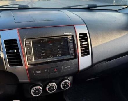 Серый Мицубиси Аутлендер, объемом двигателя 2.18 л и пробегом 287 тыс. км за 10200 $, фото 17 на Automoto.ua