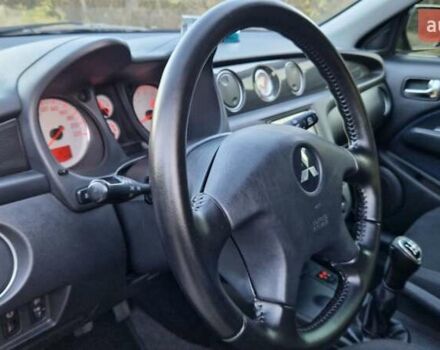 Серый Мицубиси Аутлендер, объемом двигателя 2 л и пробегом 157 тыс. км за 8300 $, фото 23 на Automoto.ua