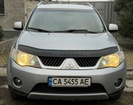Серый Мицубиси Аутлендер, объемом двигателя 2.4 л и пробегом 241 тыс. км за 7350 $, фото 1 на Automoto.ua