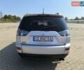 Серый Мицубиси Аутлендер, объемом двигателя 2 л и пробегом 267 тыс. км за 8750 $, фото 3 на Automoto.ua