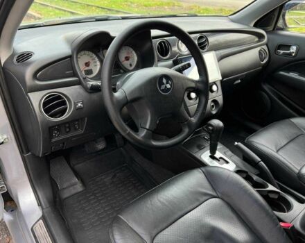 Серый Мицубиси Аутлендер, объемом двигателя 2.4 л и пробегом 170 тыс. км за 6900 $, фото 11 на Automoto.ua