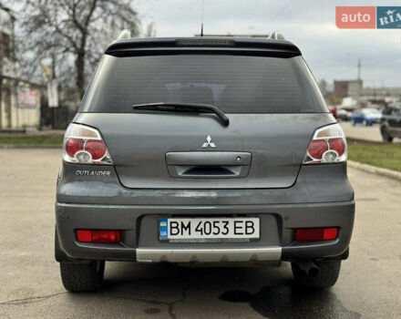 Серый Мицубиси Аутлендер, объемом двигателя 2.38 л и пробегом 254 тыс. км за 7300 $, фото 12 на Automoto.ua