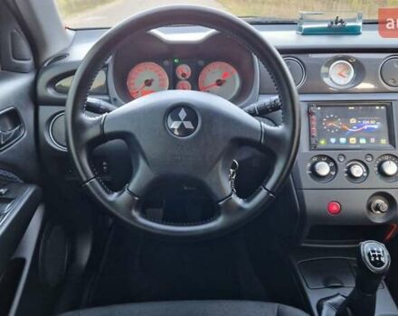 Серый Мицубиси Аутлендер, объемом двигателя 2 л и пробегом 157 тыс. км за 8300 $, фото 19 на Automoto.ua