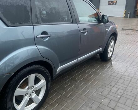 Сірий Міцубісі Аутлендер, об'ємом двигуна 2 л та пробігом 330 тис. км за 4950 $, фото 4 на Automoto.ua