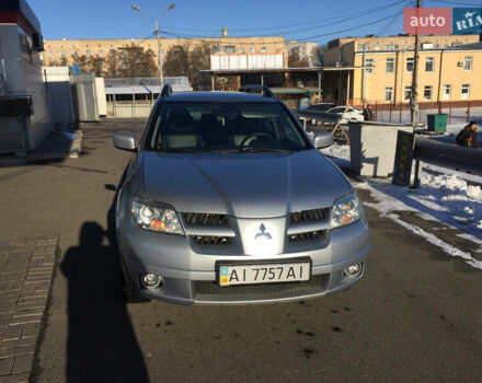 Серый Мицубиси Аутлендер, объемом двигателя 2.38 л и пробегом 191 тыс. км за 9950 $, фото 6 на Automoto.ua