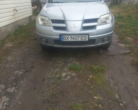 Серый Мицубиси Аутлендер, объемом двигателя 2 л и пробегом 311 тыс. км за 7100 $, фото 3 на Automoto.ua