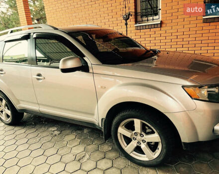 Сірий Міцубісі Аутлендер, об'ємом двигуна 2.36 л та пробігом 195 тис. км за 9500 $, фото 6 на Automoto.ua