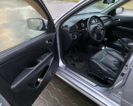 Сірий Міцубісі Аутлендер, об'ємом двигуна 2.4 л та пробігом 299 тис. км за 6300 $, фото 7 на Automoto.ua