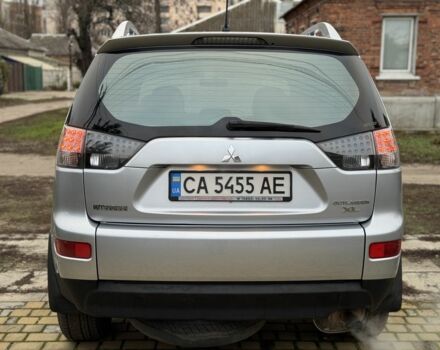 Серый Мицубиси Аутлендер, объемом двигателя 2.4 л и пробегом 241 тыс. км за 7350 $, фото 4 на Automoto.ua