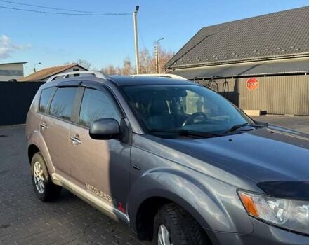 Серый Мицубиси Аутлендер, объемом двигателя 2.18 л и пробегом 287 тыс. км за 10200 $, фото 3 на Automoto.ua