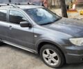 Серый Мицубиси Аутлендер, объемом двигателя 2 л и пробегом 138 тыс. км за 7800 $, фото 1 на Automoto.ua