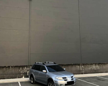 Серый Мицубиси Аутлендер, объемом двигателя 2.38 л и пробегом 191 тыс. км за 9950 $, фото 3 на Automoto.ua