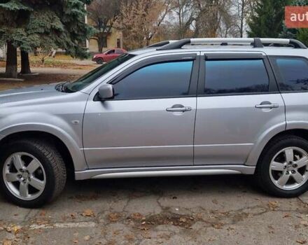 Серый Мицубиси Аутлендер, объемом двигателя 2.38 л и пробегом 113 тыс. км за 8900 $, фото 6 на Automoto.ua