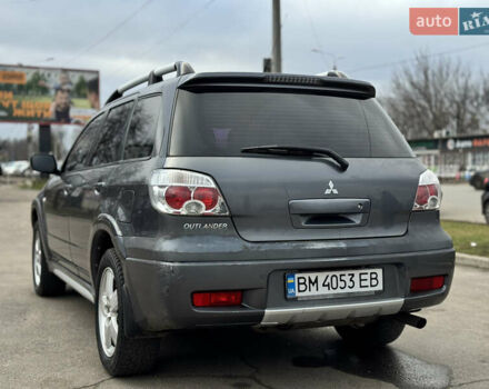 Серый Мицубиси Аутлендер, объемом двигателя 2.38 л и пробегом 254 тыс. км за 7300 $, фото 11 на Automoto.ua