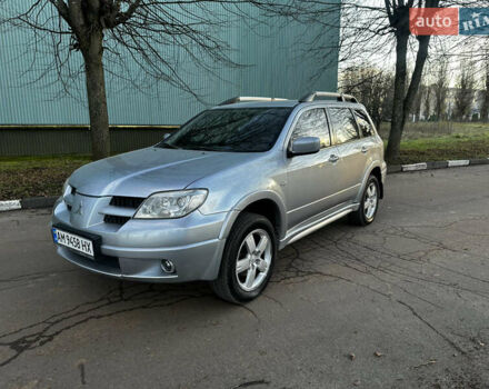 Серый Мицубиси Аутлендер, объемом двигателя 2.4 л и пробегом 320 тыс. км за 6000 $, фото 5 на Automoto.ua