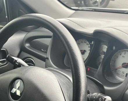 Сірий Міцубісі Аутлендер, об'ємом двигуна 2.4 л та пробігом 324 тис. км за 6890 $, фото 19 на Automoto.ua