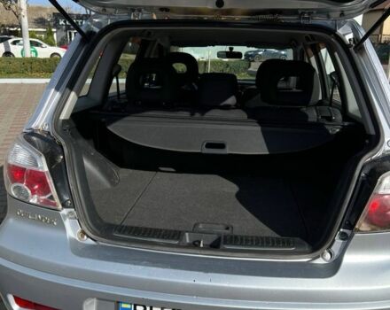 Серый Мицубиси Аутлендер, объемом двигателя 2 л и пробегом 214 тыс. км за 7300 $, фото 2 на Automoto.ua