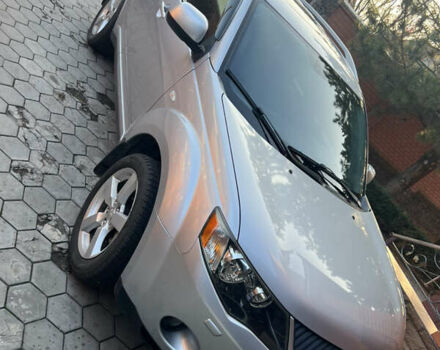 Сірий Міцубісі Аутлендер, об'ємом двигуна 2.36 л та пробігом 195 тис. км за 9500 $, фото 2 на Automoto.ua