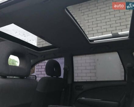 Серый Мицубиси Аутлендер, объемом двигателя 2 л и пробегом 170 тыс. км за 6950 $, фото 7 на Automoto.ua