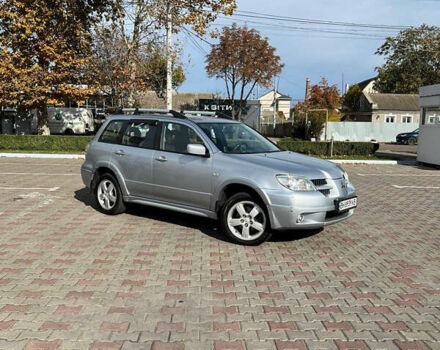 Сірий Міцубісі Аутлендер, об'ємом двигуна 2 л та пробігом 214 тис. км за 6900 $, фото 4 на Automoto.ua