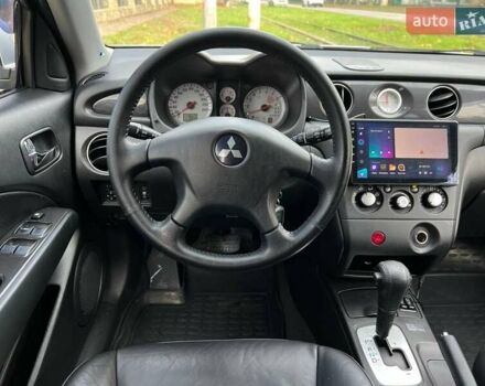 Серый Мицубиси Аутлендер, объемом двигателя 2.38 л и пробегом 170 тыс. км за 6900 $, фото 14 на Automoto.ua