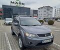 Серый Мицубиси Аутлендер, объемом двигателя 2.4 л и пробегом 169 тыс. км за 7000 $, фото 1 на Automoto.ua