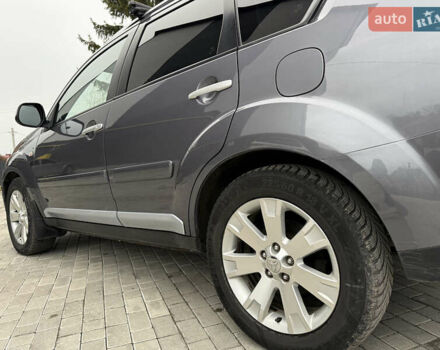 Сірий Міцубісі Аутлендер, об'ємом двигуна 2 л та пробігом 237 тис. км за 8999 $, фото 26 на Automoto.ua