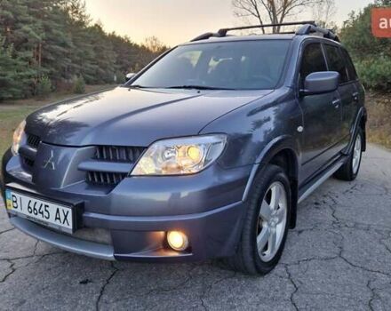 Серый Мицубиси Аутлендер, объемом двигателя 2 л и пробегом 157 тыс. км за 8300 $, фото 9 на Automoto.ua