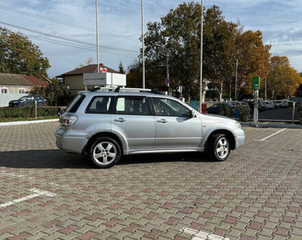 Сірий Міцубісі Аутлендер, об'ємом двигуна 2 л та пробігом 214 тис. км за 6900 $, фото 2 на Automoto.ua