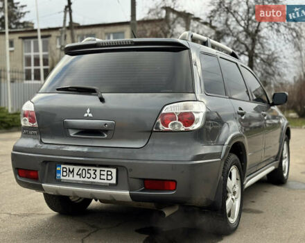 Серый Мицубиси Аутлендер, объемом двигателя 2.38 л и пробегом 254 тыс. км за 7300 $, фото 13 на Automoto.ua