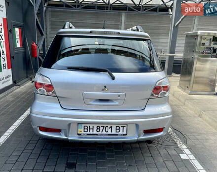 Сірий Міцубісі Аутлендер, об'ємом двигуна 2 л та пробігом 130 тис. км за 8500 $, фото 2 на Automoto.ua