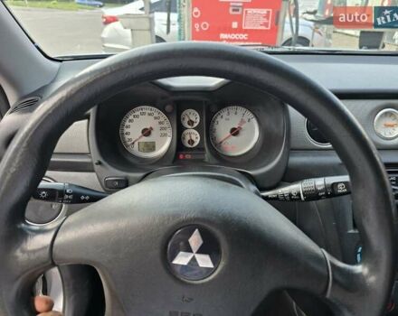Серый Мицубиси Аутлендер, объемом двигателя 2 л и пробегом 151 тыс. км за 7500 $, фото 5 на Automoto.ua