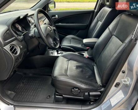 Серый Мицубиси Аутлендер, объемом двигателя 2.38 л и пробегом 170 тыс. км за 6900 $, фото 10 на Automoto.ua